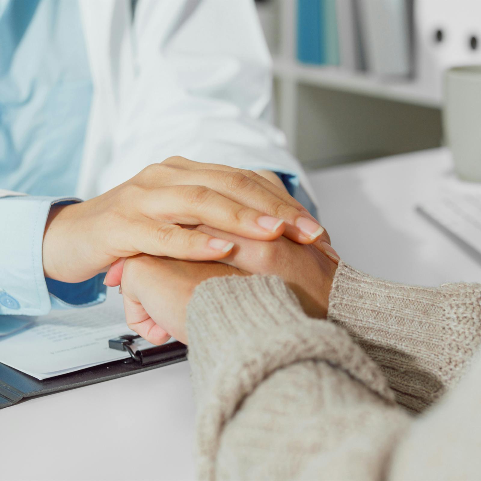 doctor comforting patient