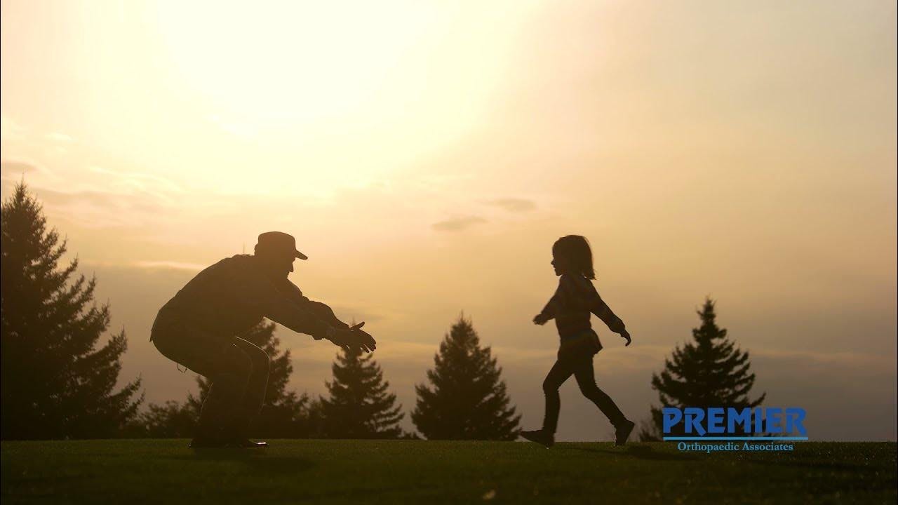 girl running to dad