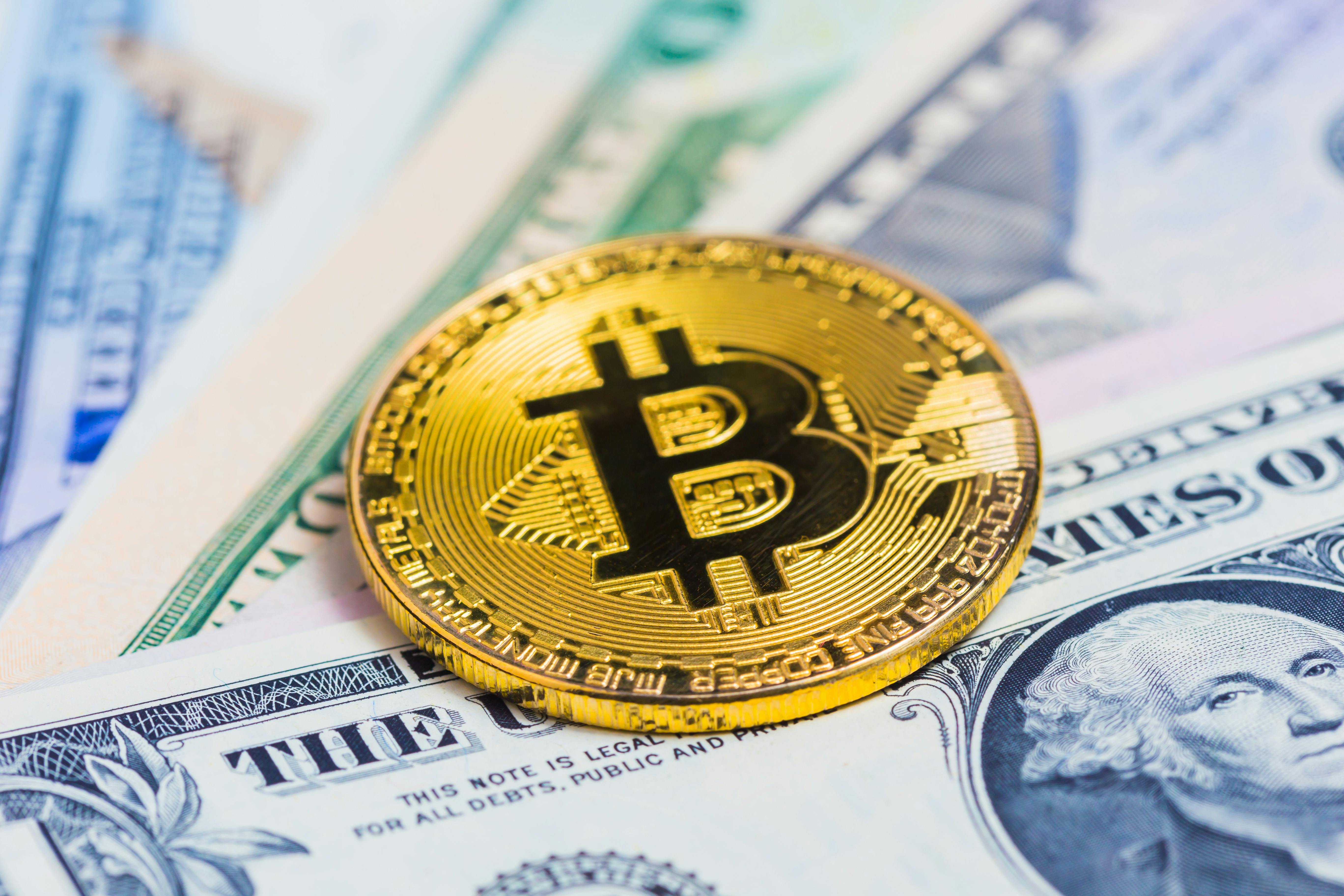 OG Bitcoin on dollars (1).jpeg Decoding the Fed: How Fedspeak Influences Markets and Bitcoin's Rally