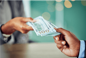 Handing cash off