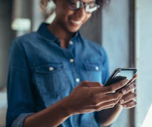Woman smiling on phone