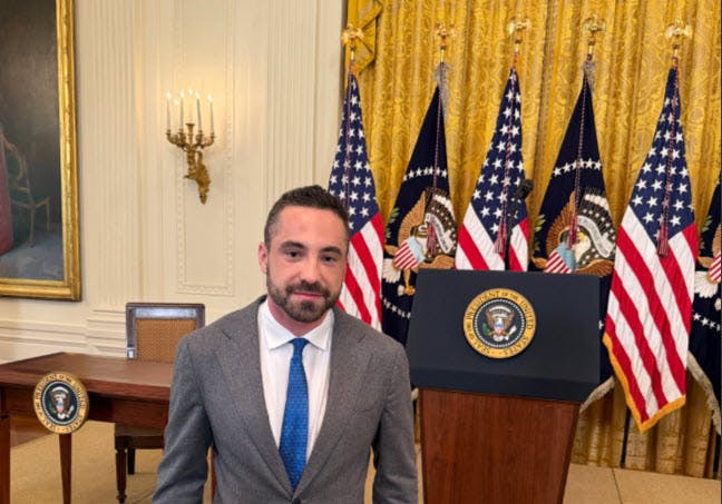 CoinFlip CEO Ben Weiss at the signing for the GENIUS Act