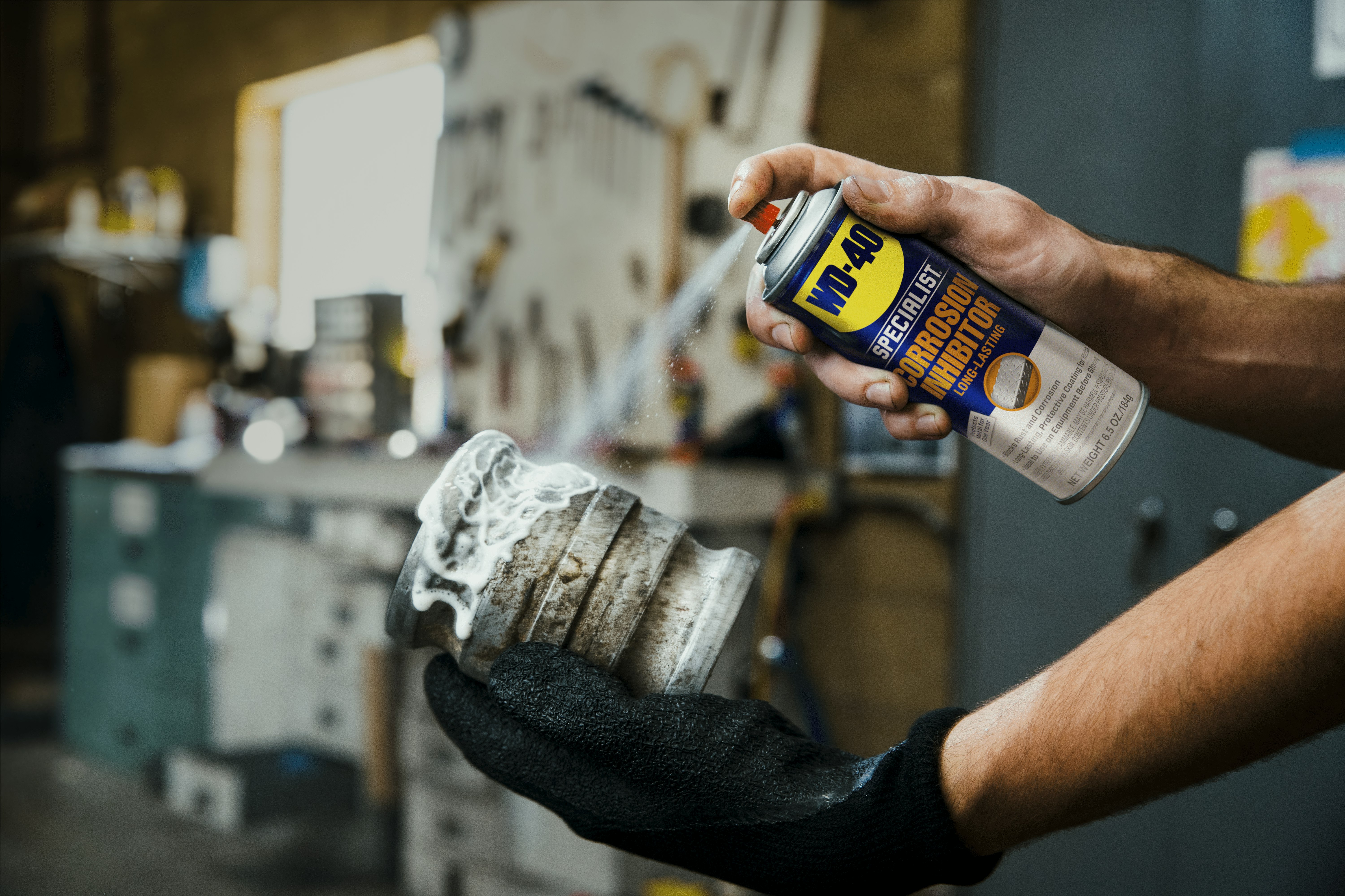 Can of WD-40 Specialist ® Corrosion Inhibitor Spraying In Use