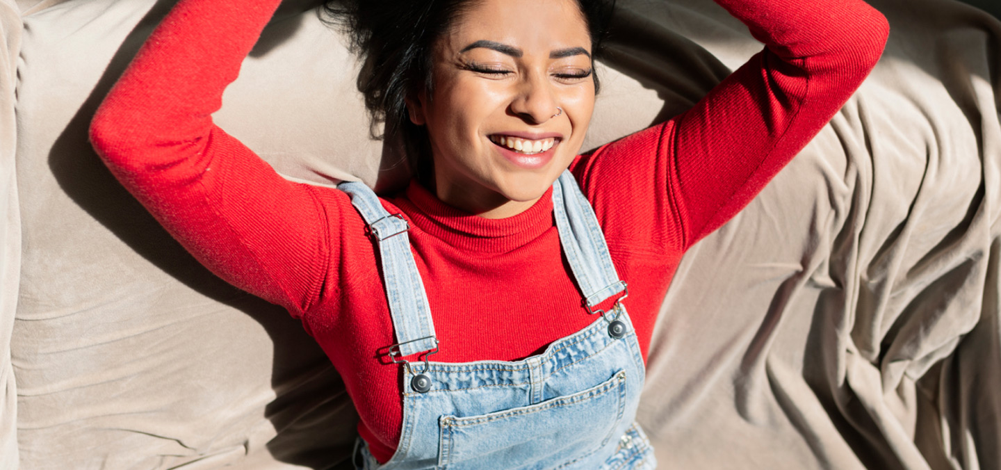 Happy woman in red jumper