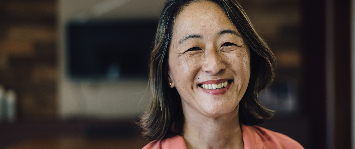 Woman at home smiling