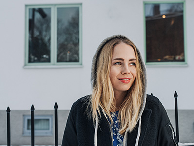 Woman wearing hoodie on the street