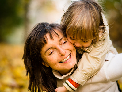 Woman playing with toddler