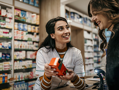 Pharmacist serving a customer