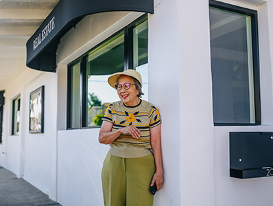 Woman outside a real estate office