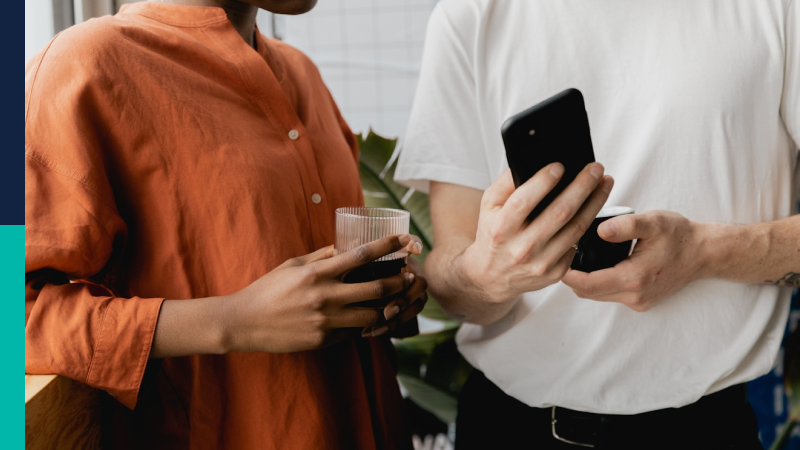 People looking at a phone