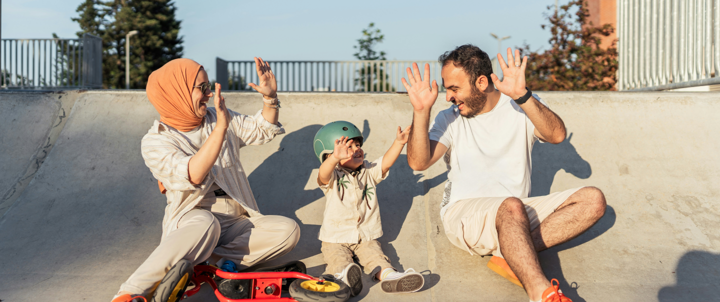 Young family at skate park