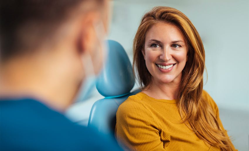 Woman in chair smiling