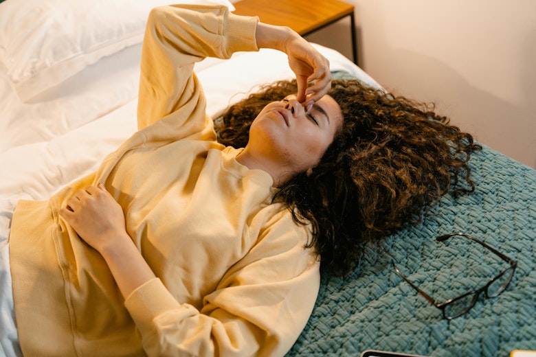 an image of Can period pain cause nausea in teens? article