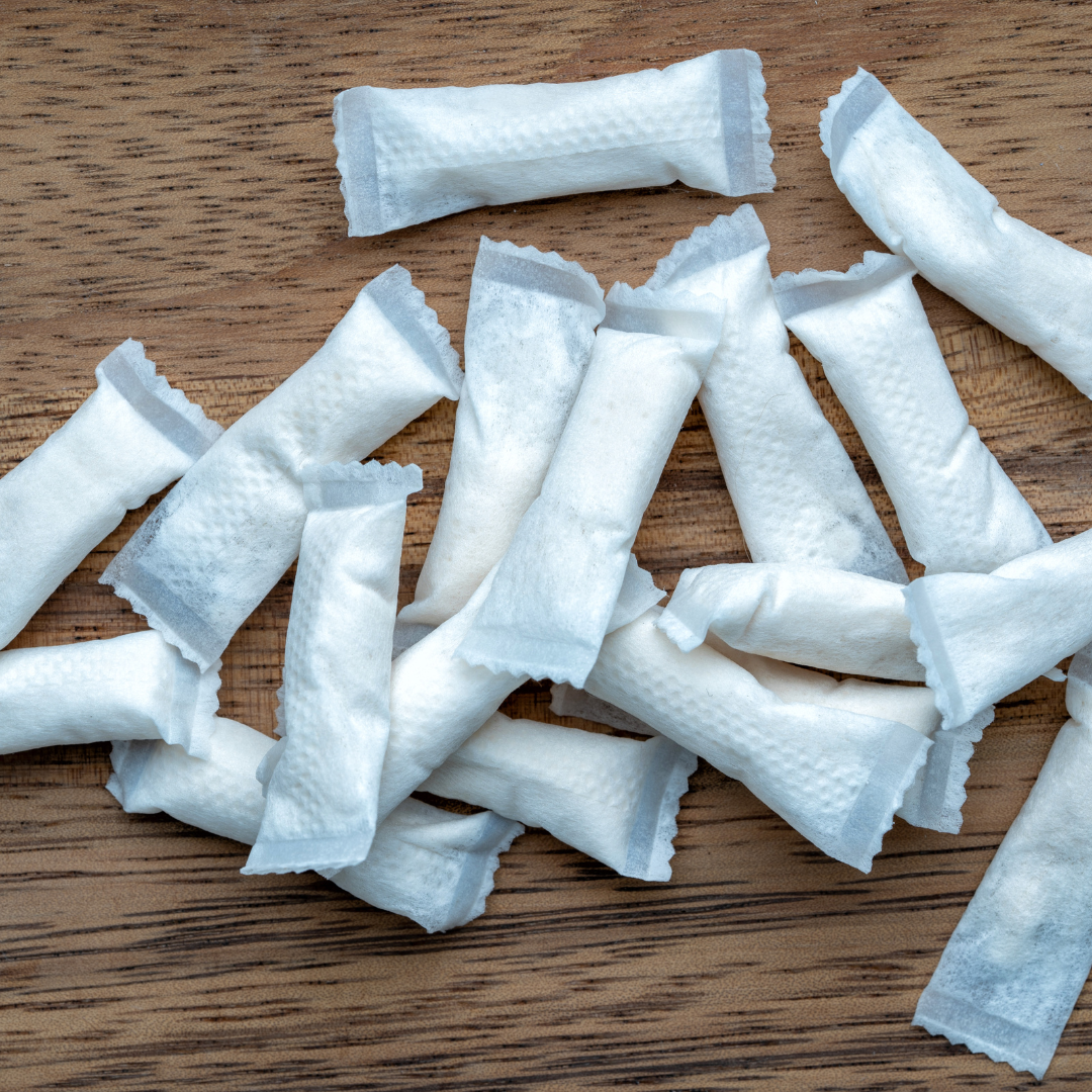 Several upper deckies scattered on a wooden table.
