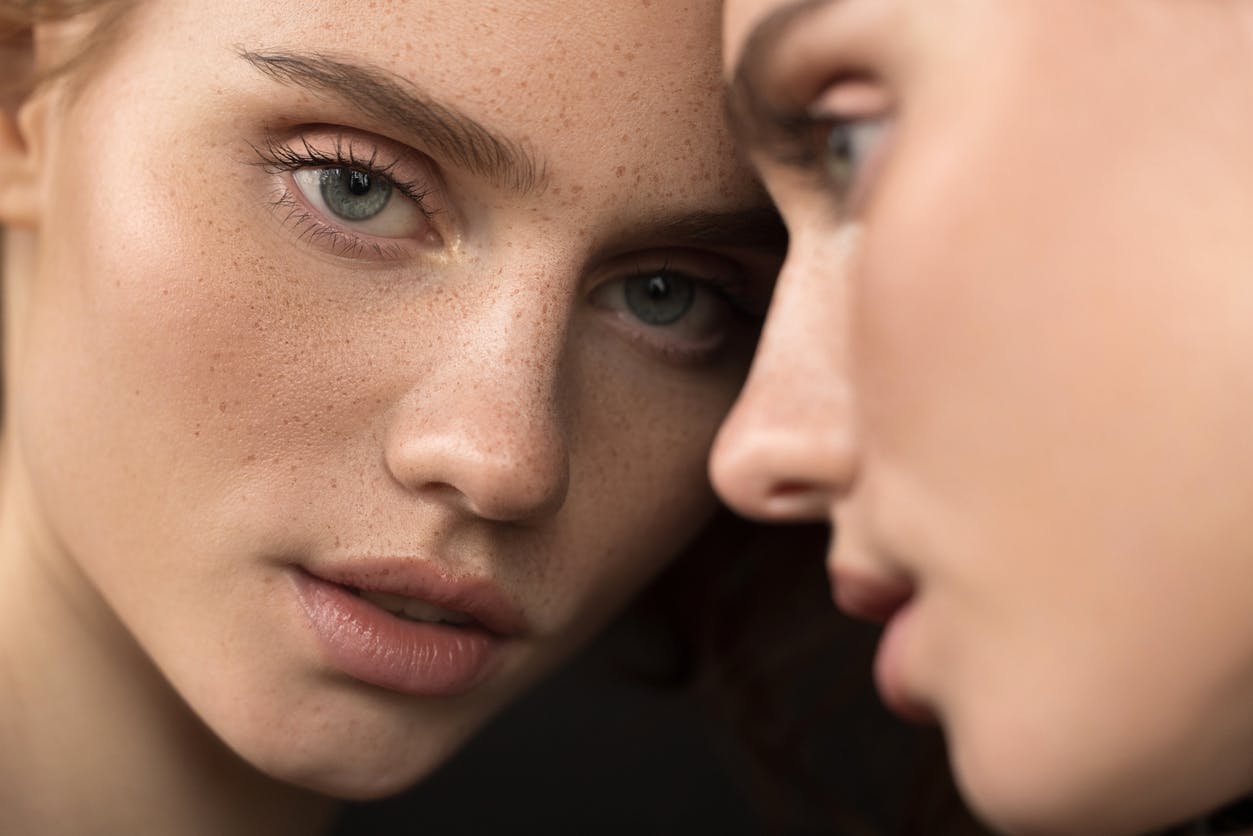 Woman looking in a mirror