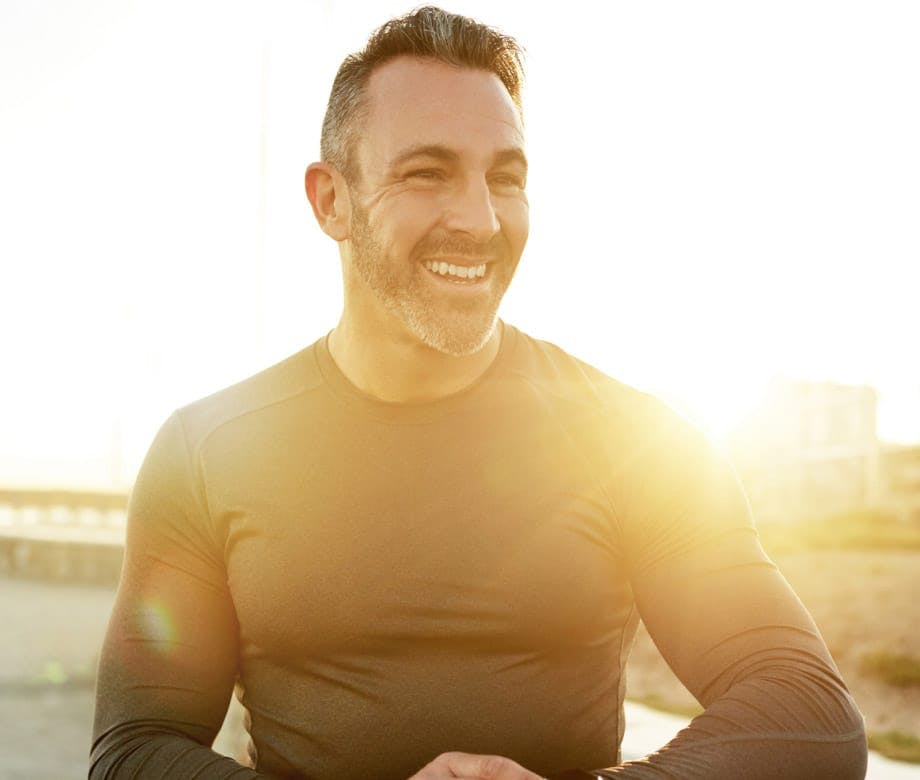 Man with gray hair smiling
