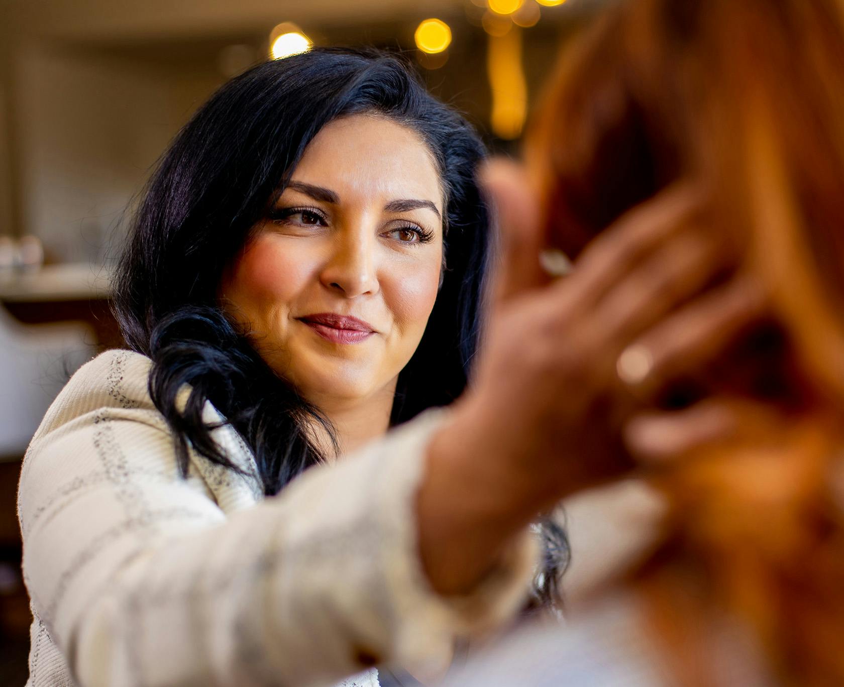 Dr. Lily Daniali working with patient