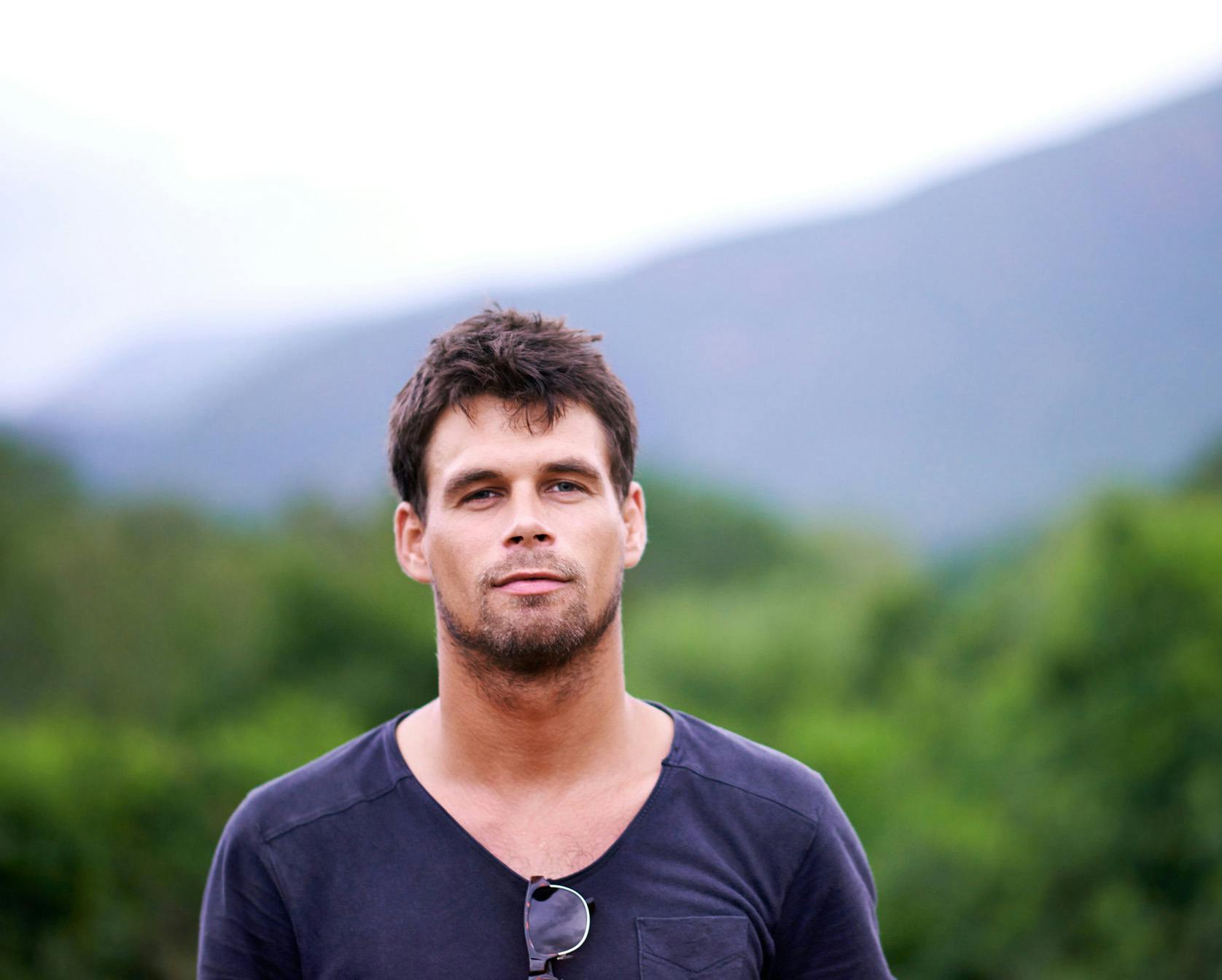 Man with brown hair smiling