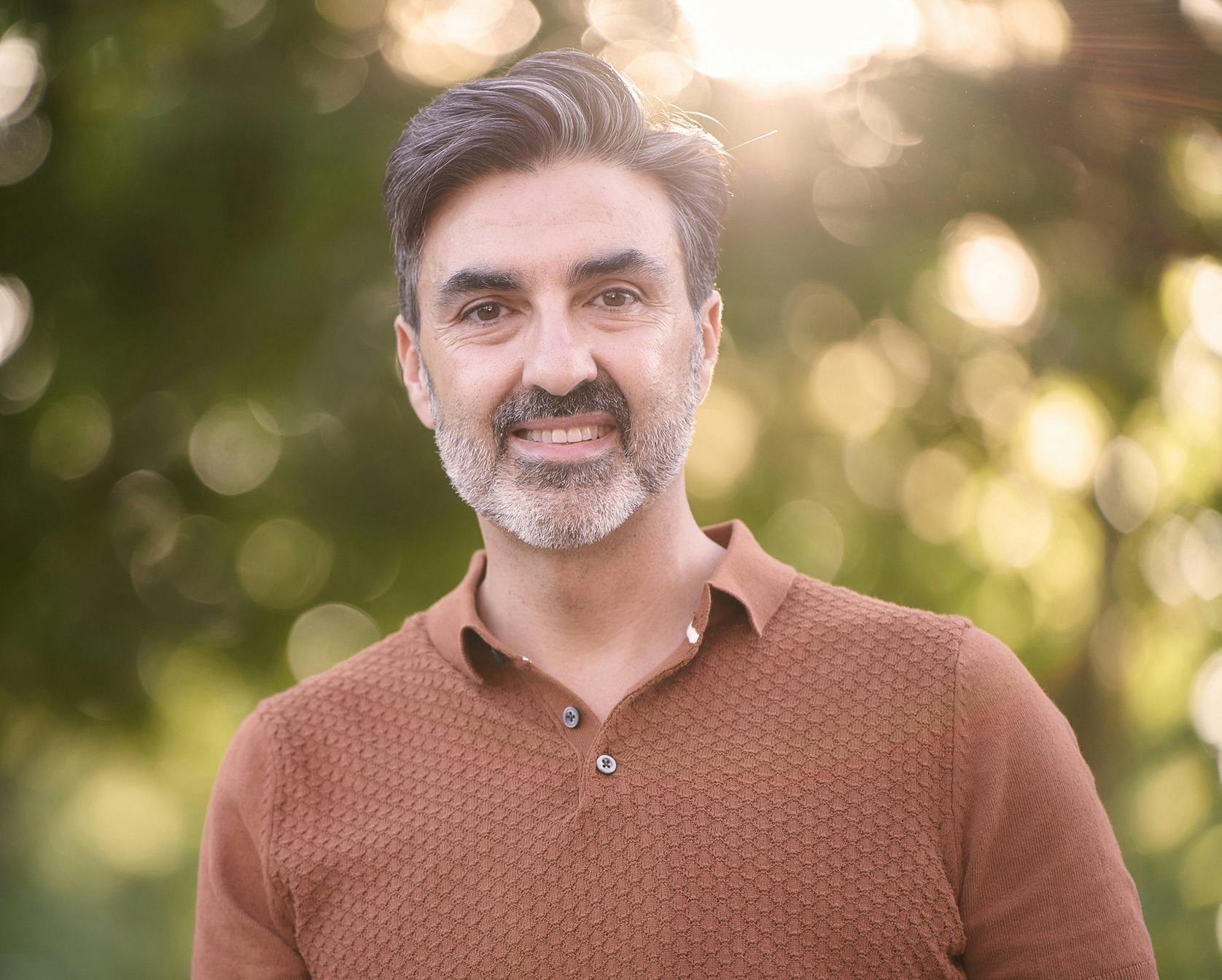 Man with gray hair smiling