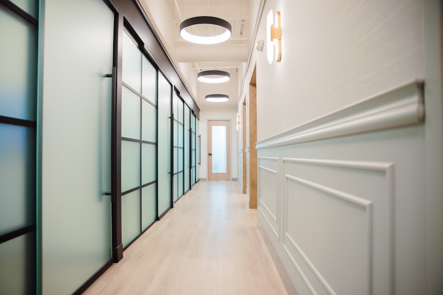 hallway with patient room of LaVie Plastic Surgery