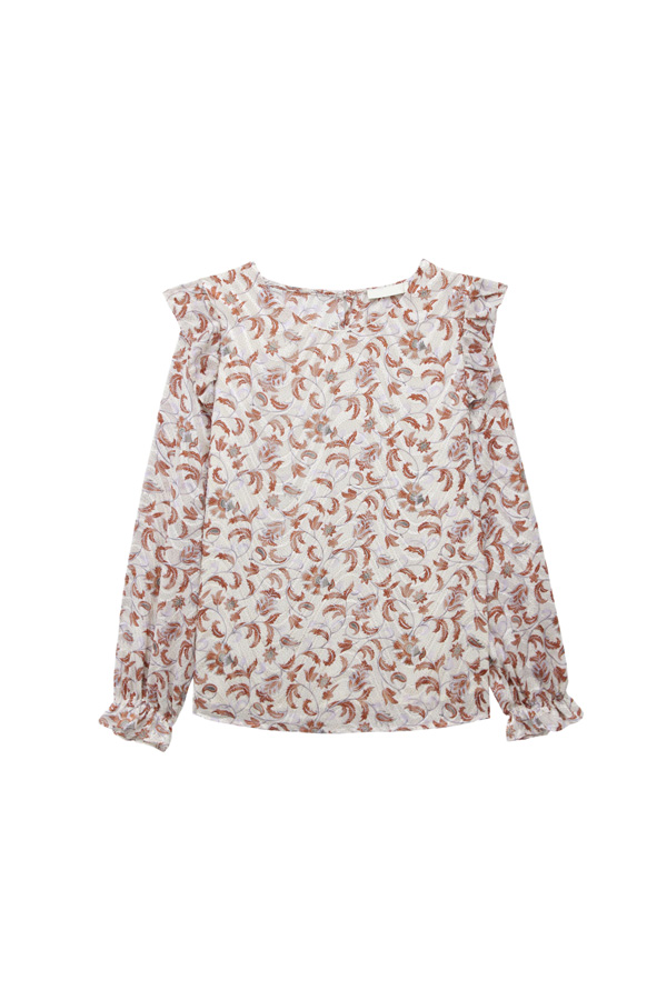 La blusa de gasa se convierte en el must de este verano