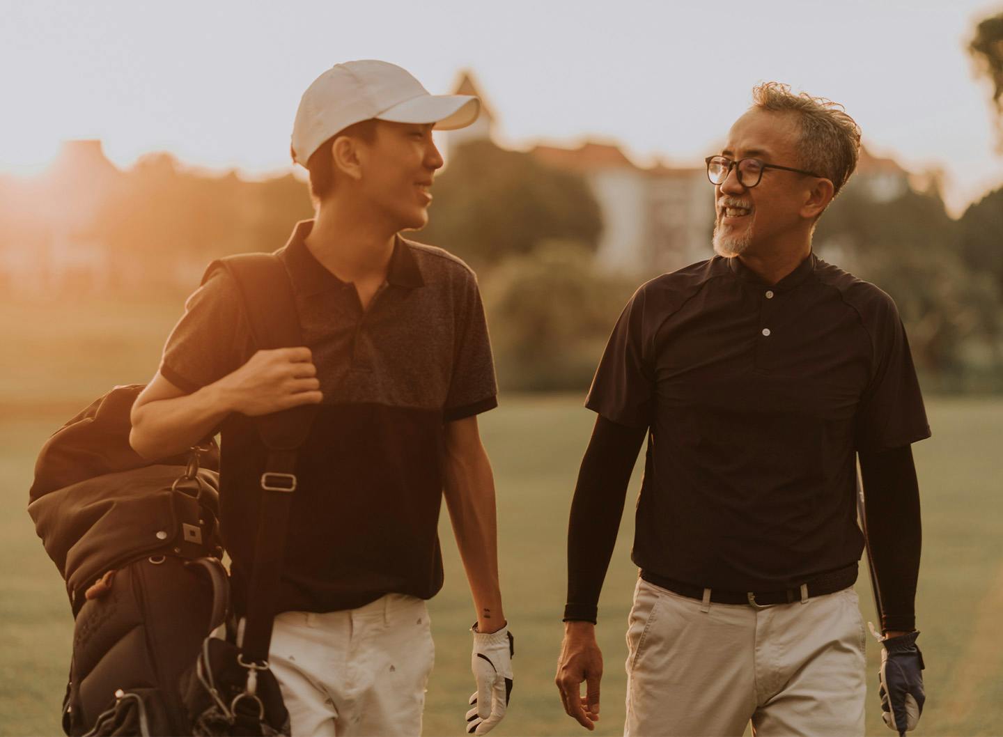 consulting with caddie on the golf course