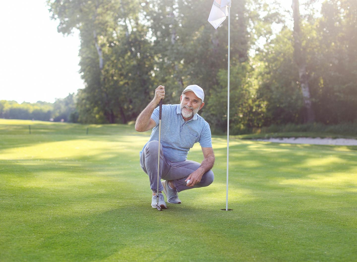 man on putting green