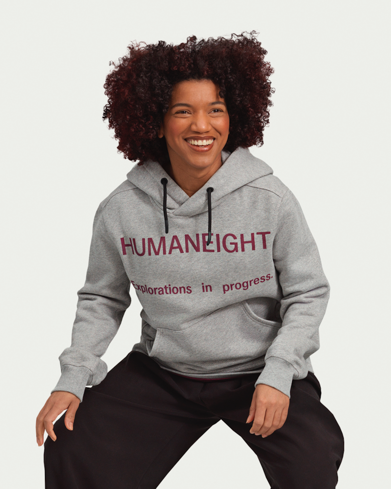 Woman_in_fitted_humaneight_hoodie