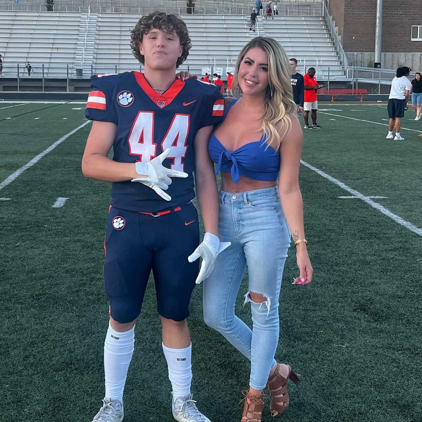 Influencer Mom Straddles Son At High School Football Game And Then
