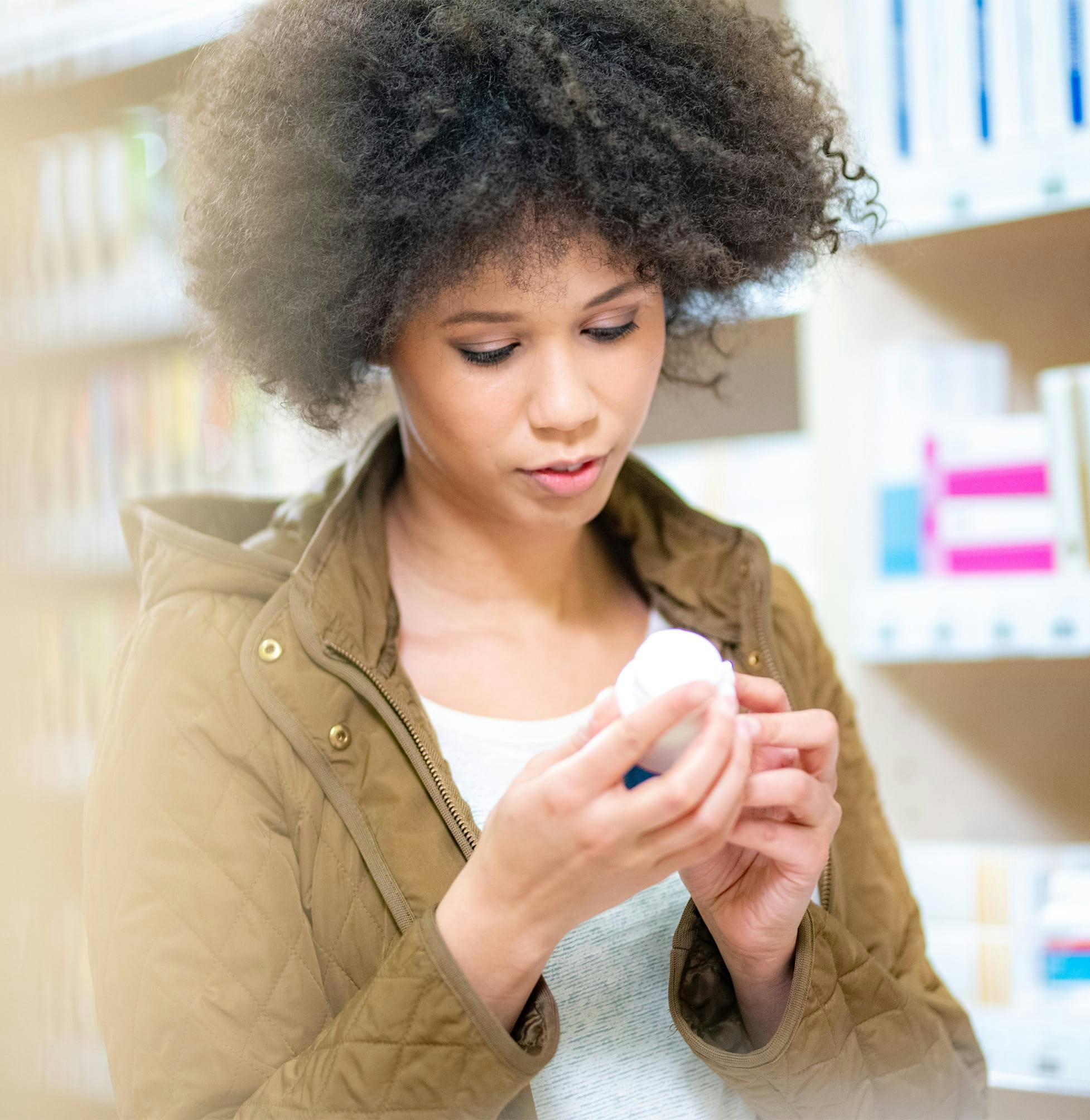 Woman looking at a prescription