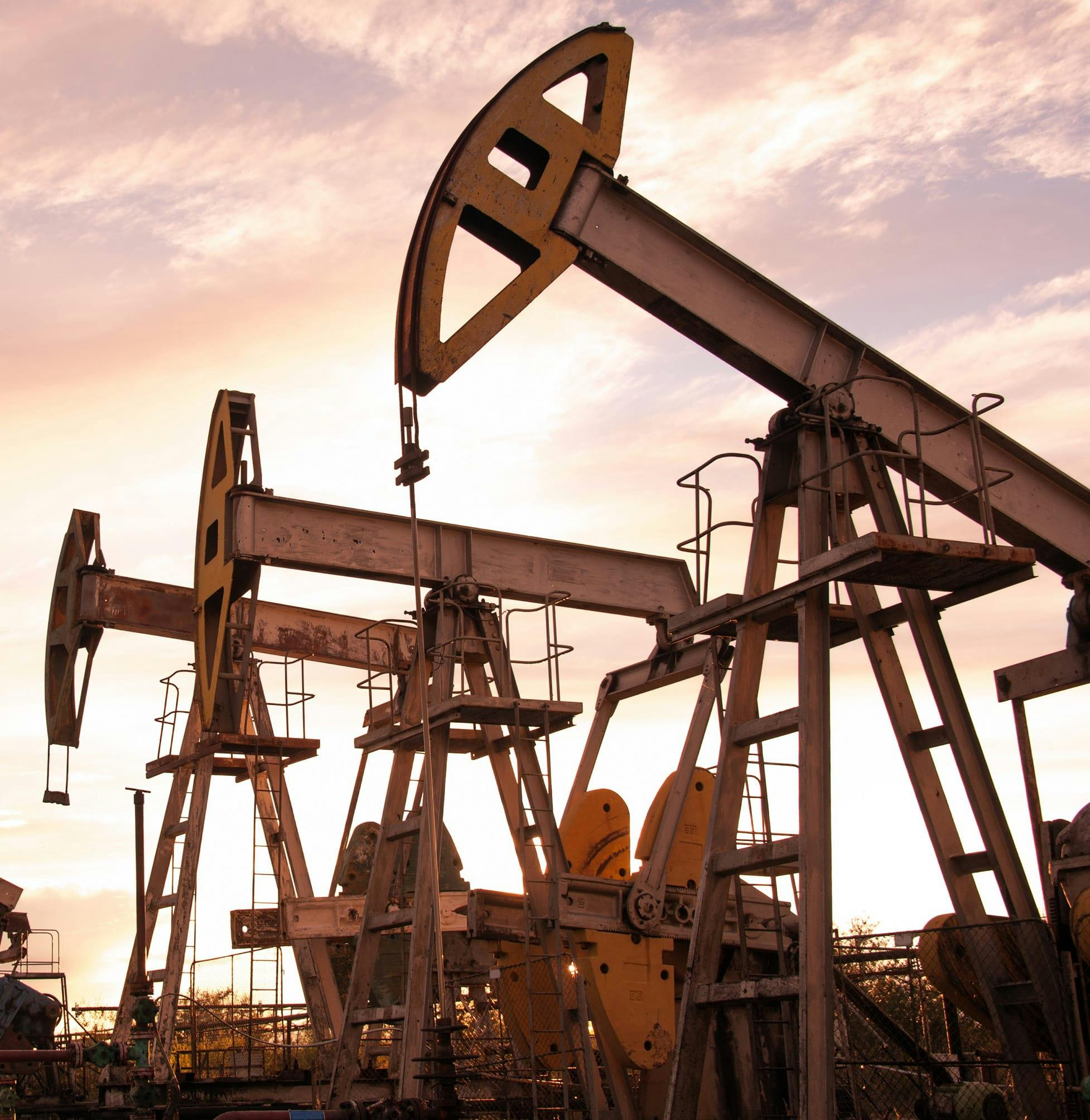 Pump jacks at sunset