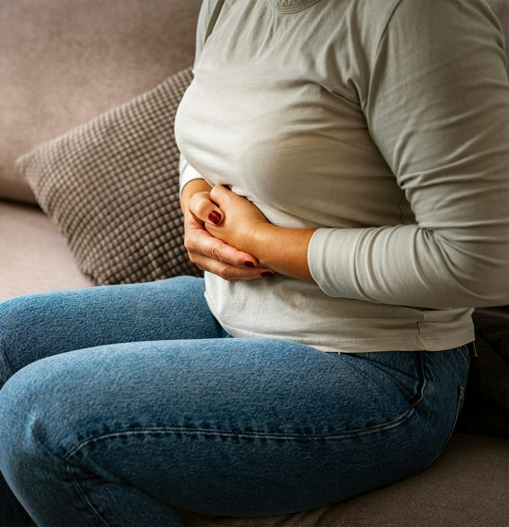 Woman holding her stomach
