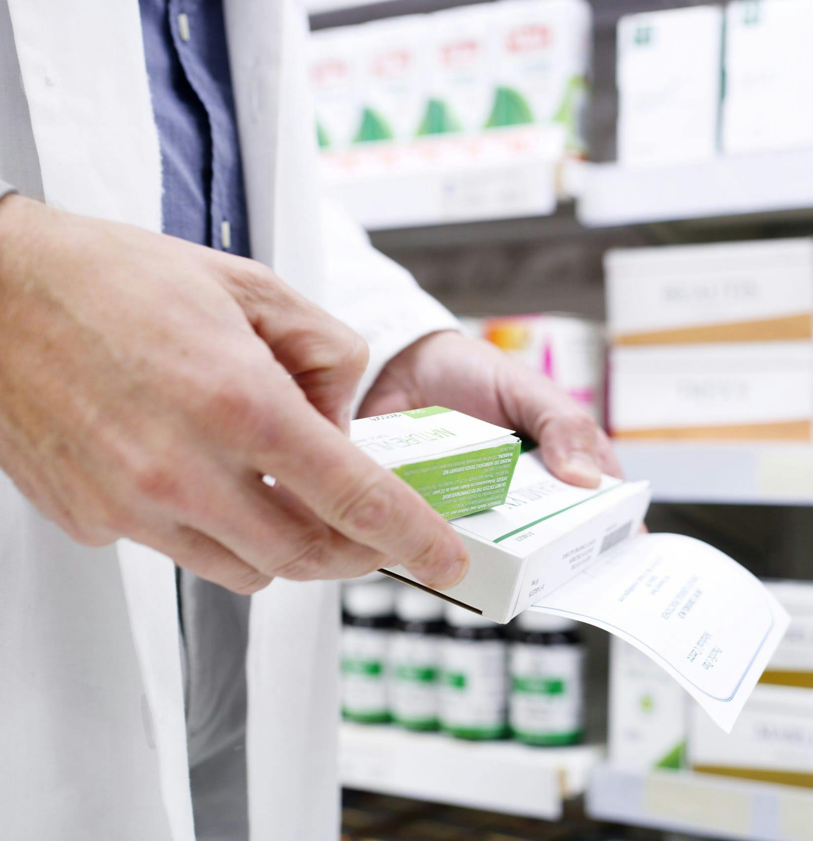 Pharmacist looking at a prescription