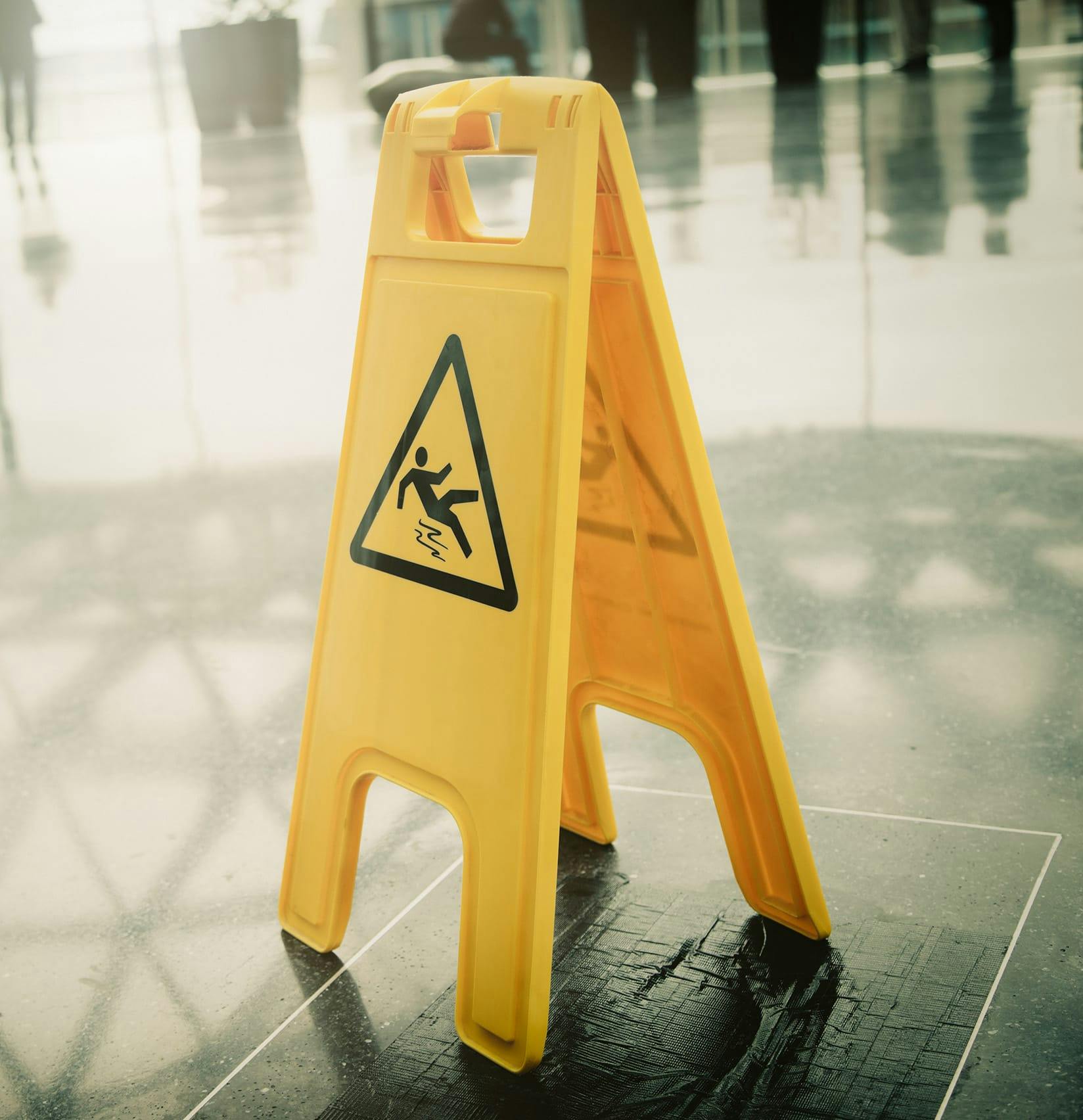 Slippery floor sign
