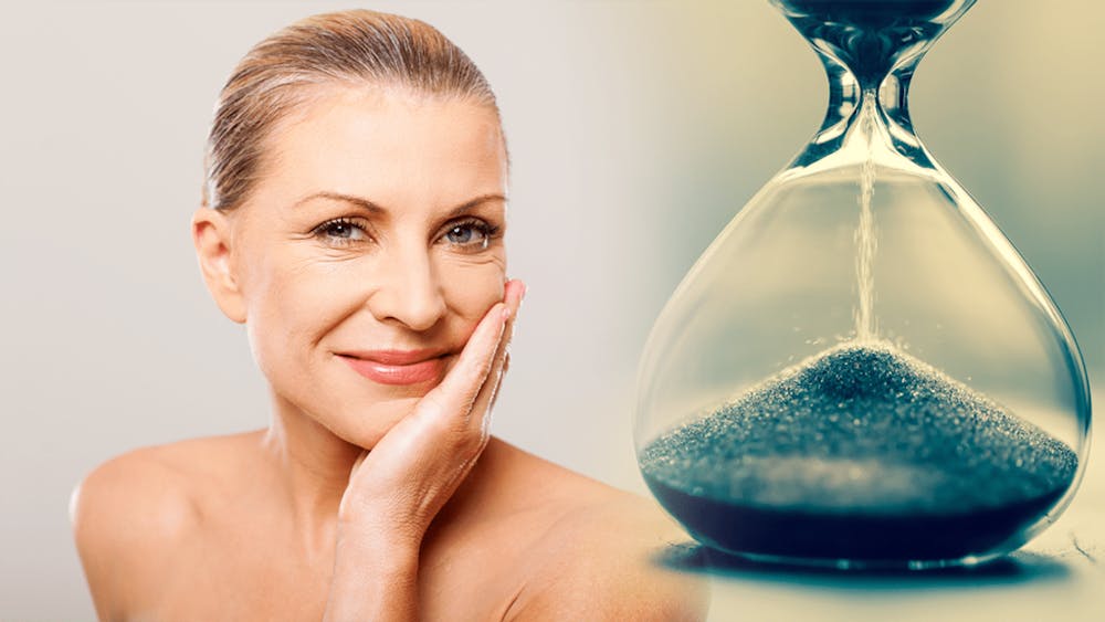 Woman fat transfer time Middle age woman and hourglass representing how long an aesthetic procedure last.