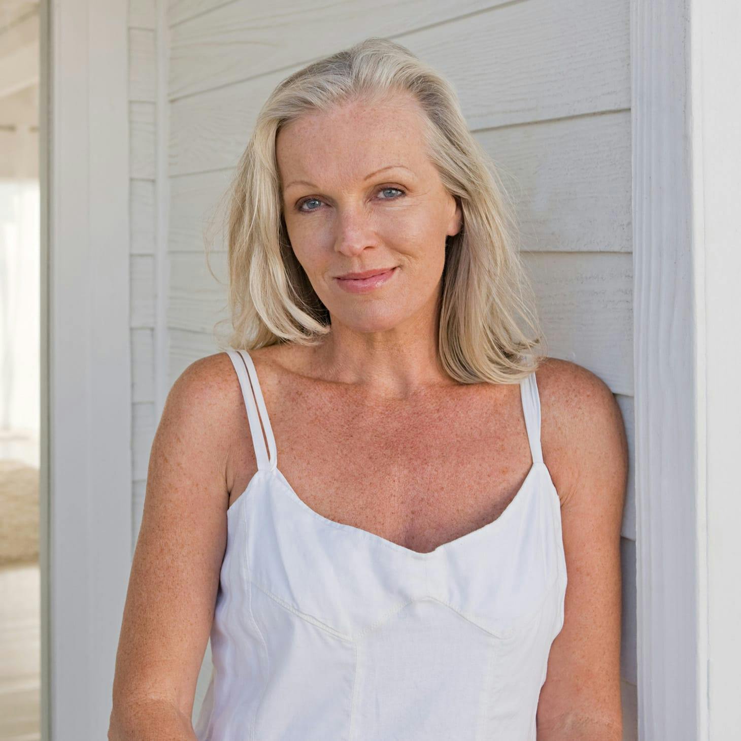 woman in a white top