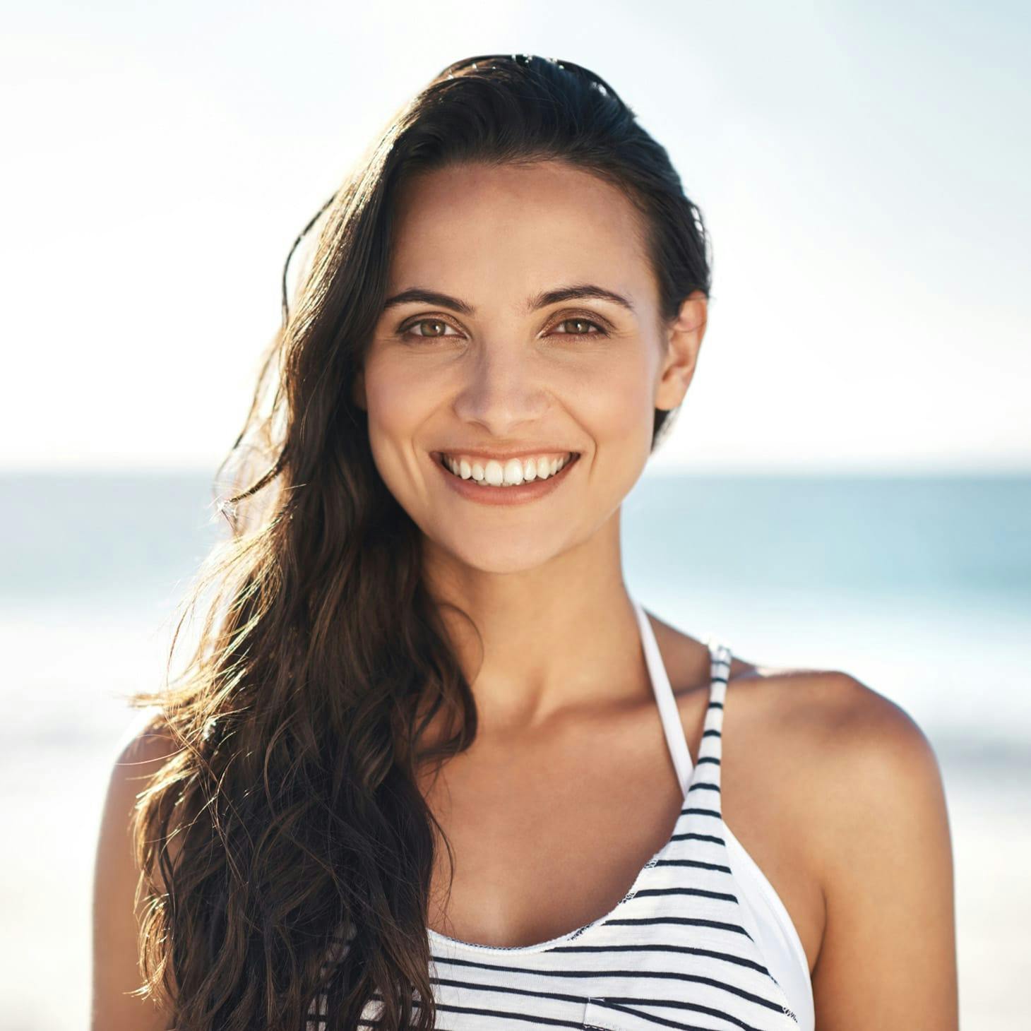 woman with long wavy dark hair