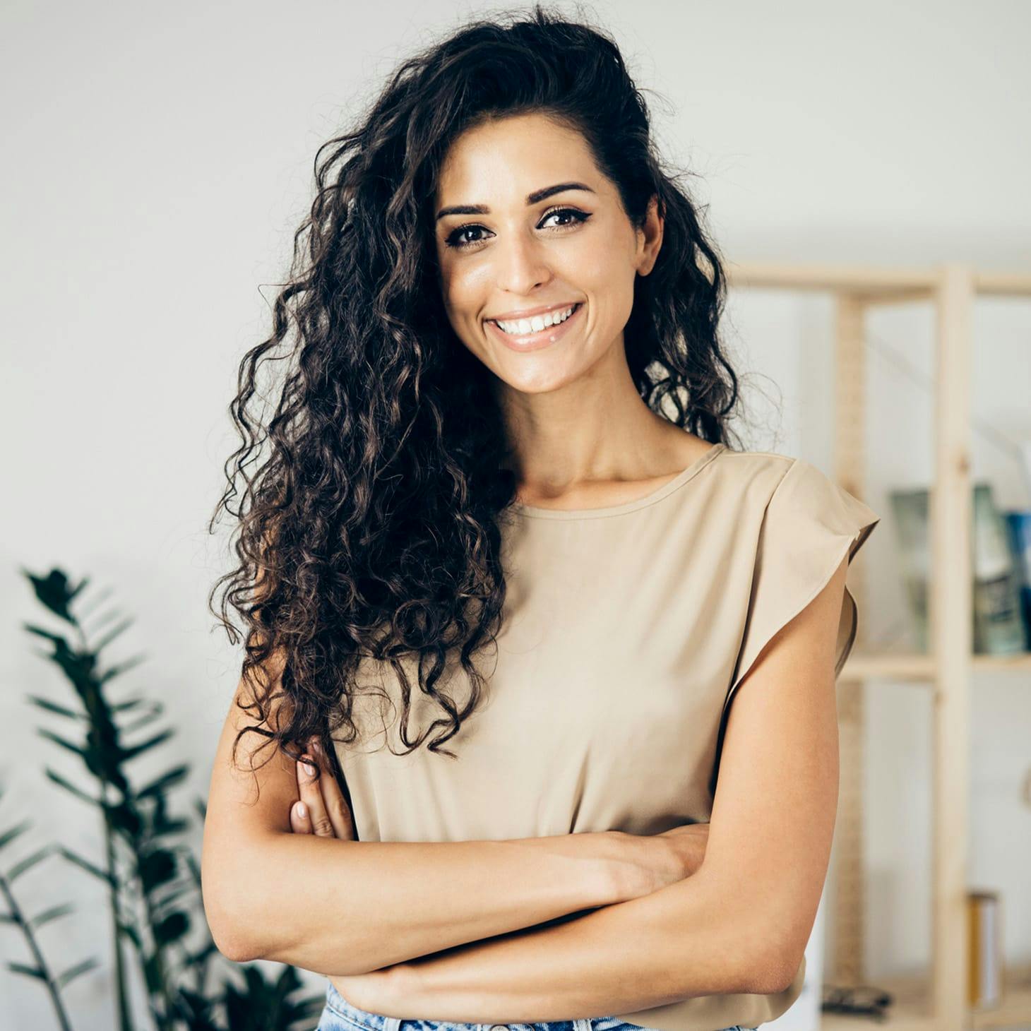 woman with long curly dark hair