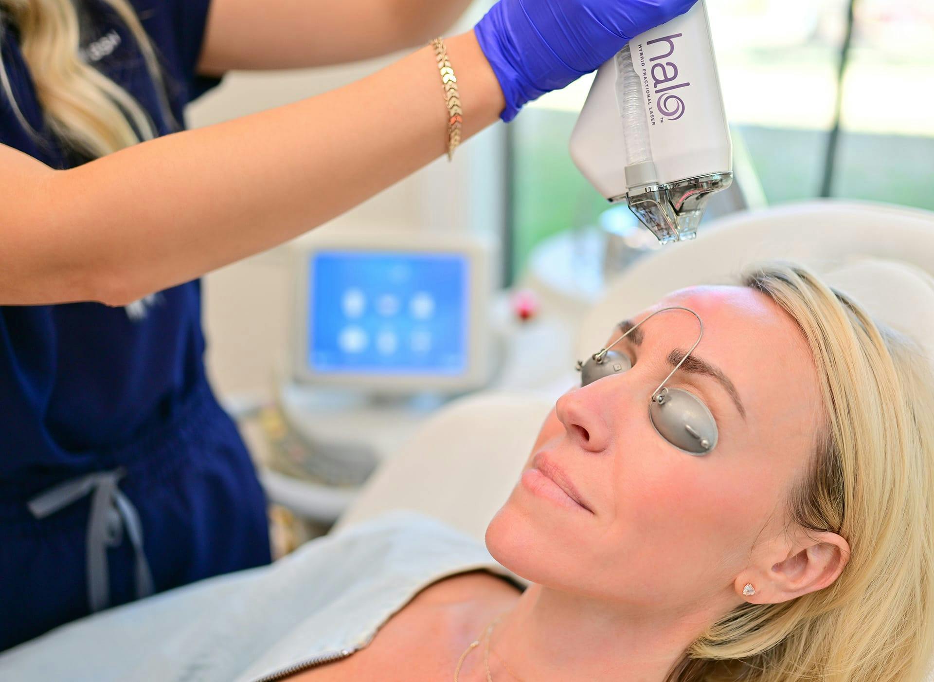 woman undergoing Halo laser treatment
