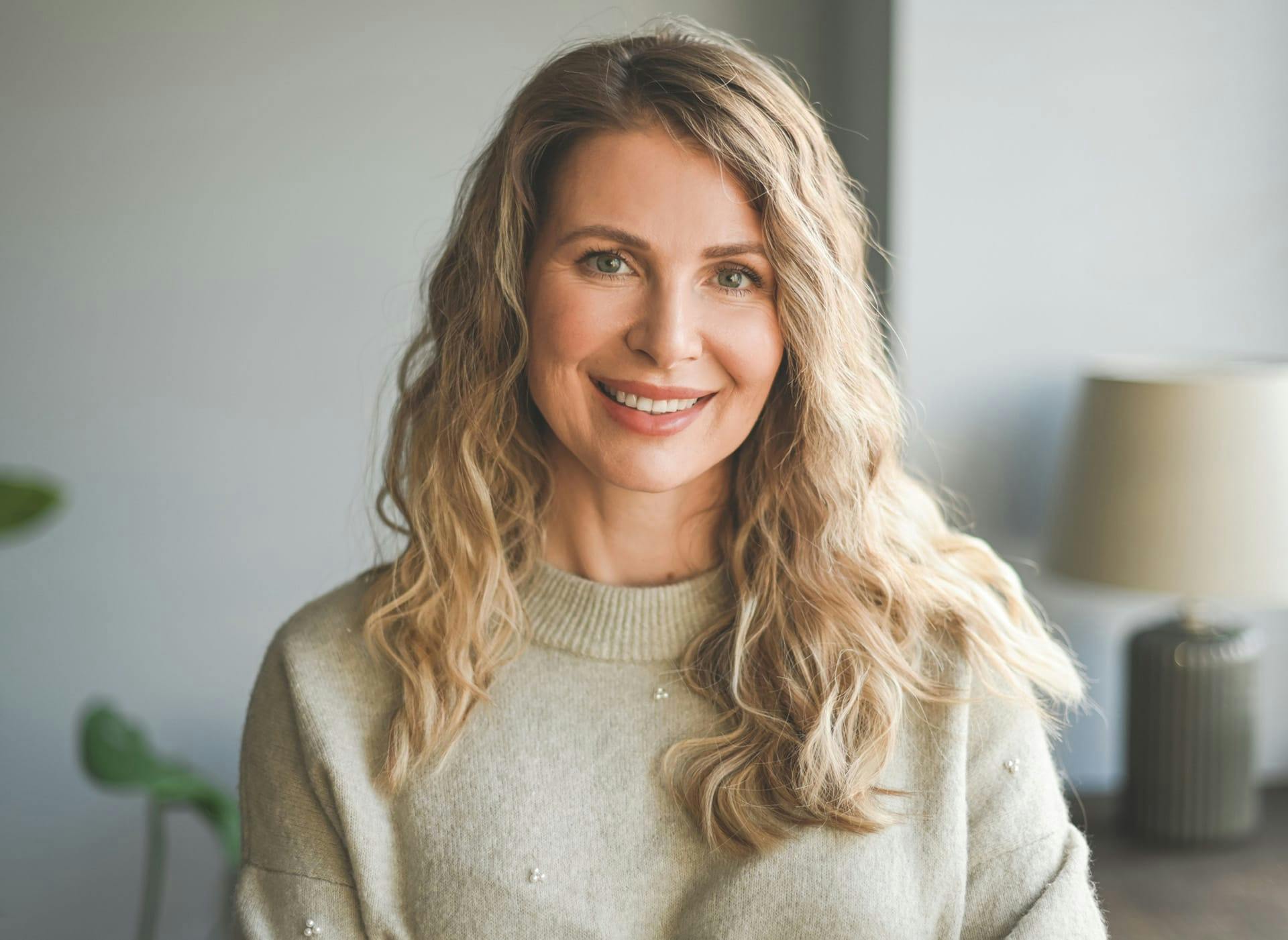 woman with blonde hair smiling