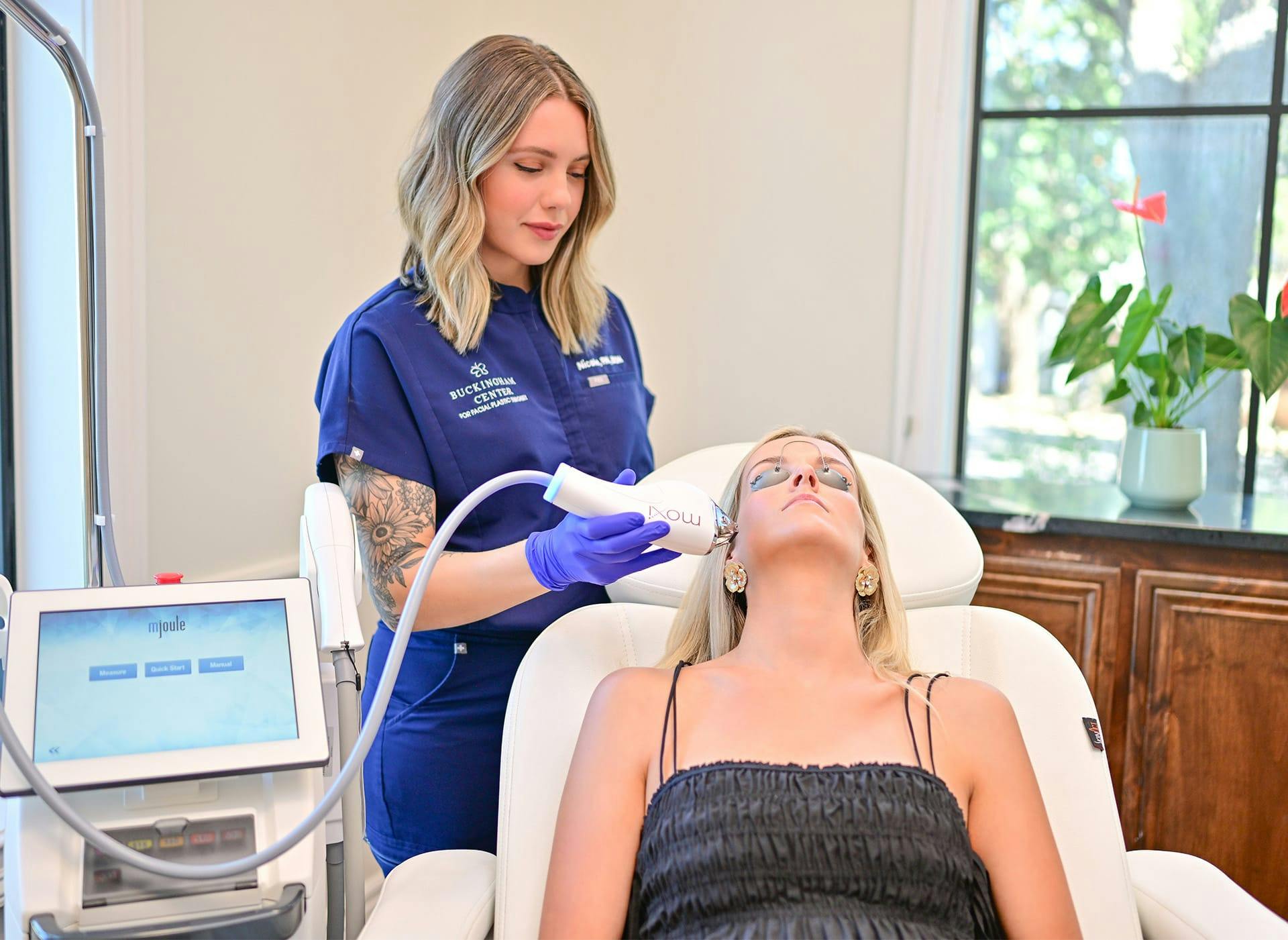 woman getting Moxi laser treatment