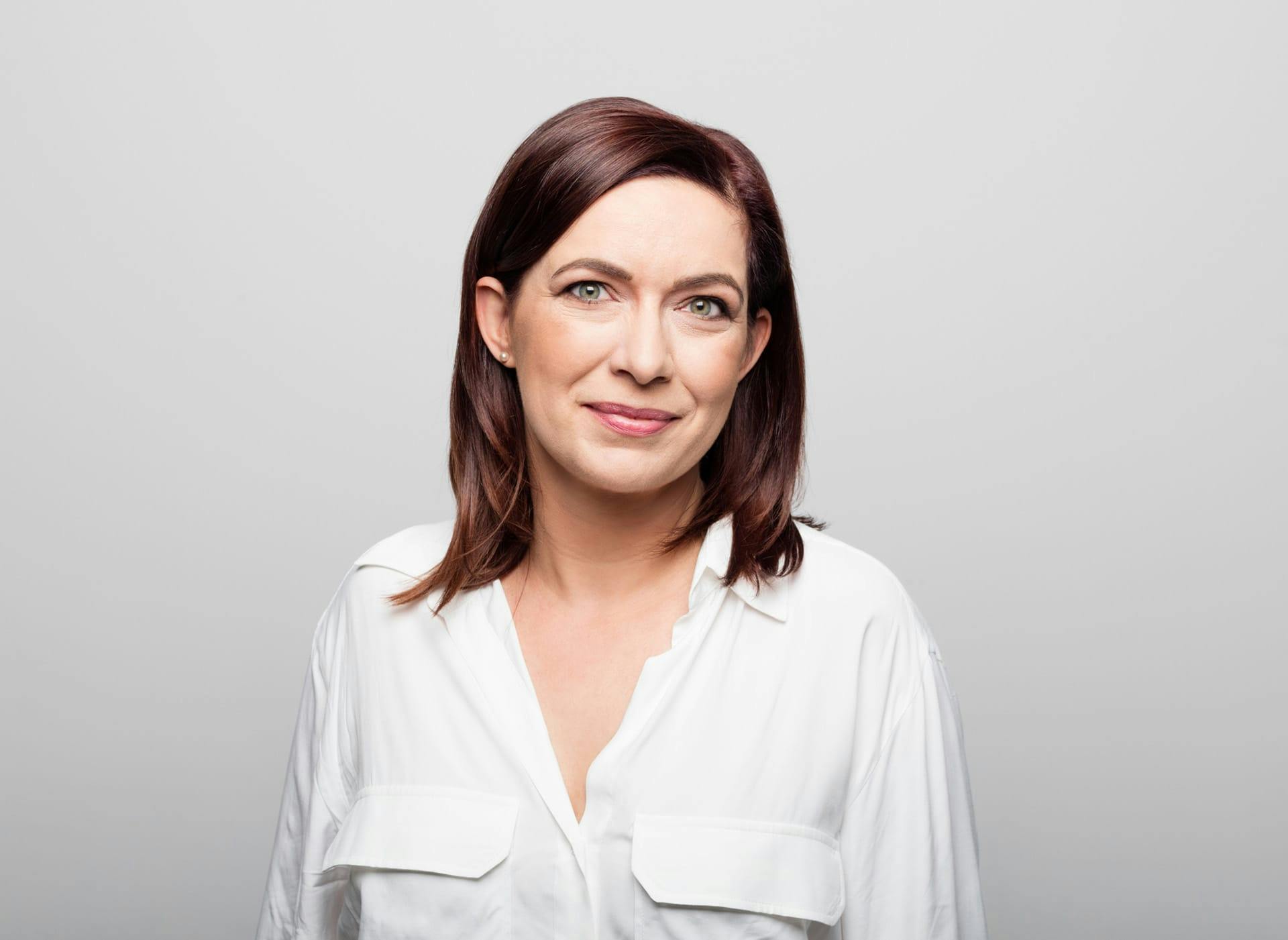 woman in a white top