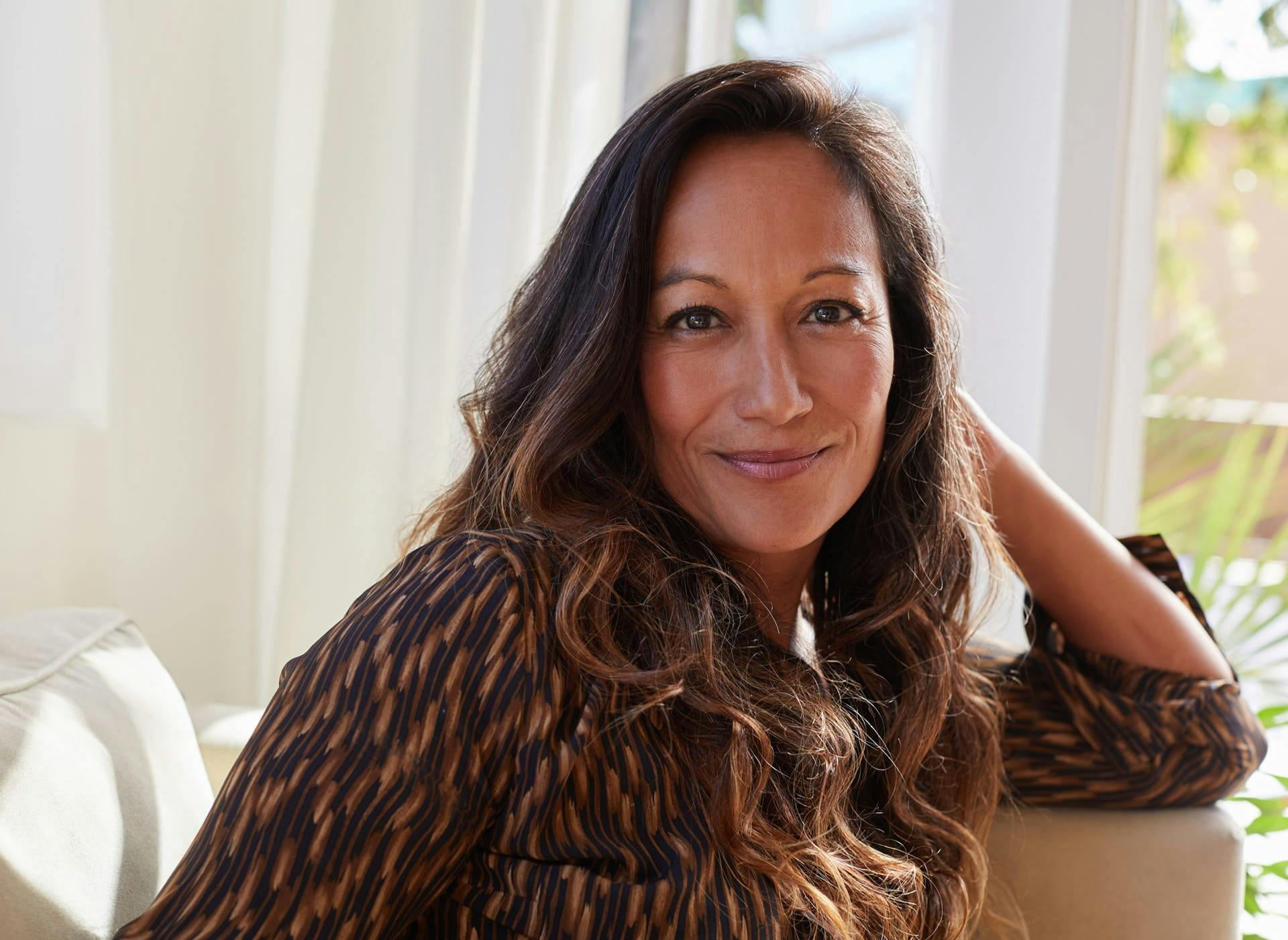 woman in a patterned top