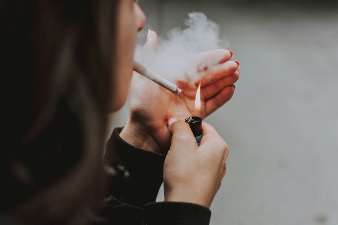 Photo by <a href="https://unsplash.com/@lilartsy?utm_content=creditCopyText&utm_medium=referral&utm_source=unsplash">lilartsy</a> on <a href="https://unsplash.com/photos/woman-lights-her-cigarette-with-lighter-whrscqDO0O4?utm_content=creditCopyText&utm_medium=referral&utm_source=unsplash">Unsplash</a>