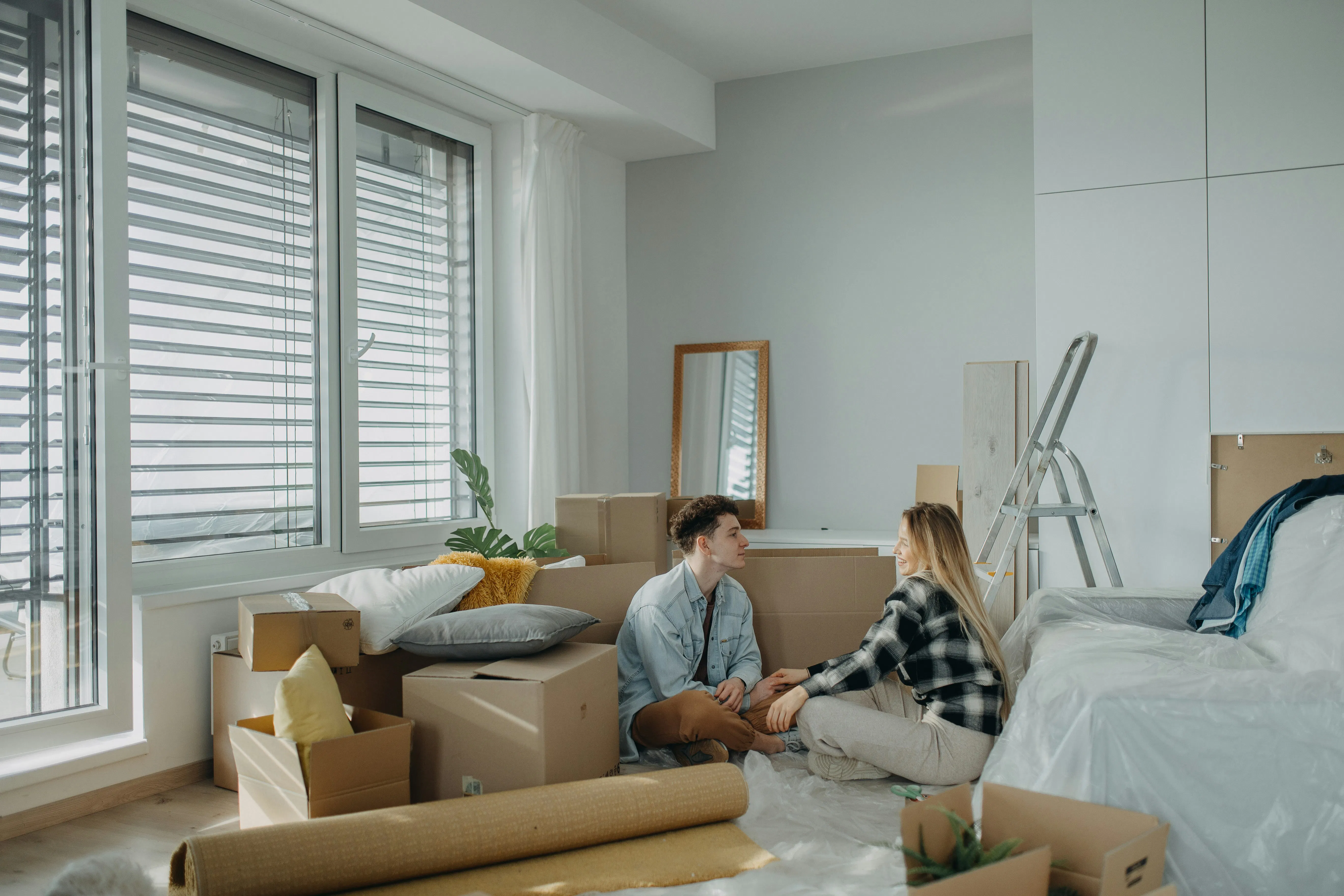 Couple moving in to new flat