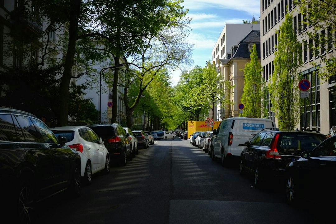 Apartment buildings along a street in a Frankfurt residential neighbourhood (Photo by Alex Ugolkov on Unsplash)