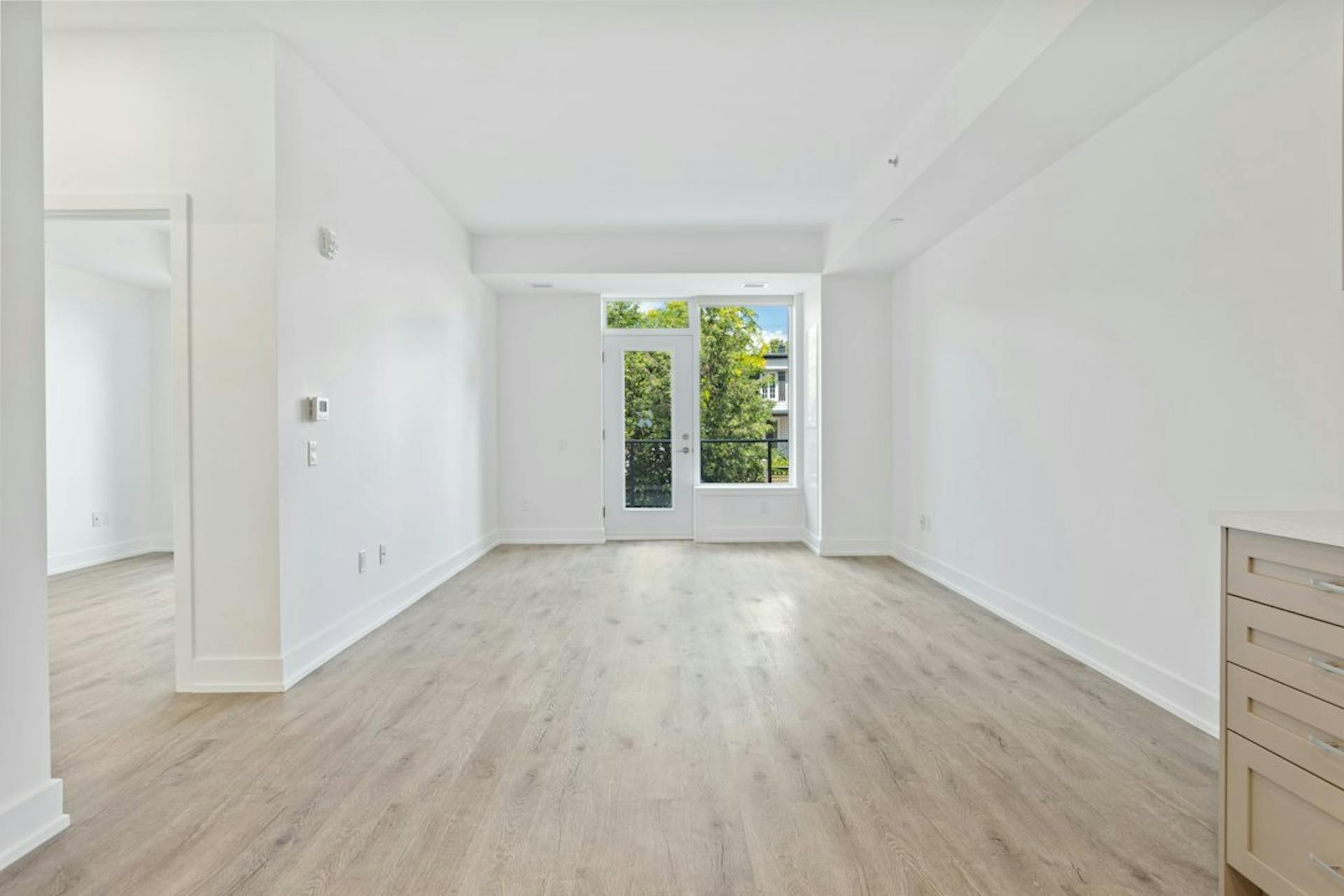 Empty bright apartment with wooden floor ready for handover (Photo by Point3D Commercial Imaging Ltd. on Unsplash)