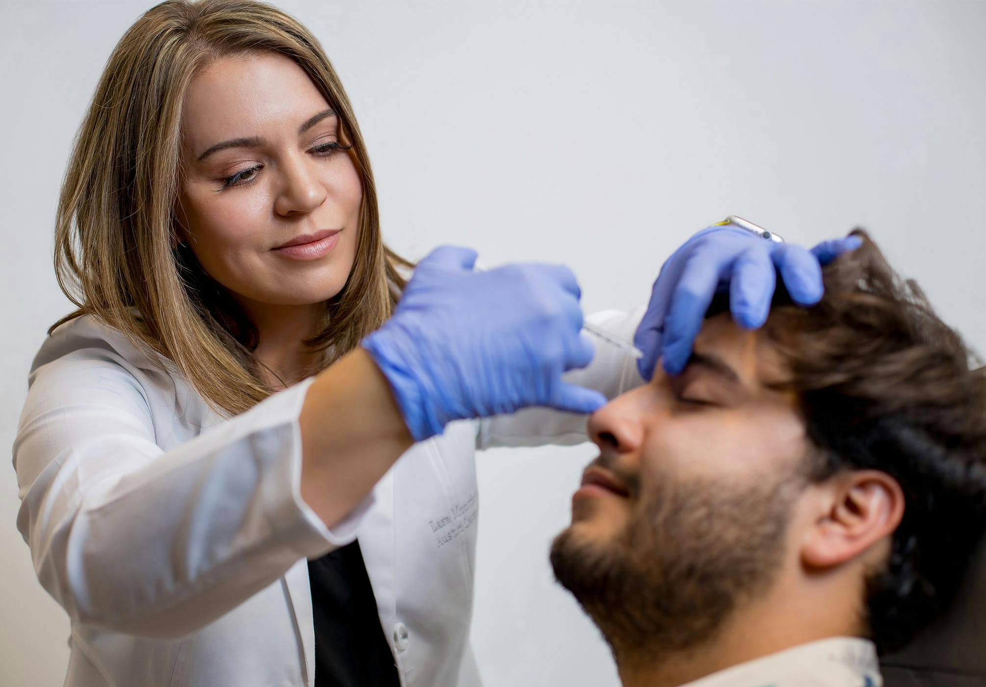 Man receiving injectable treatment