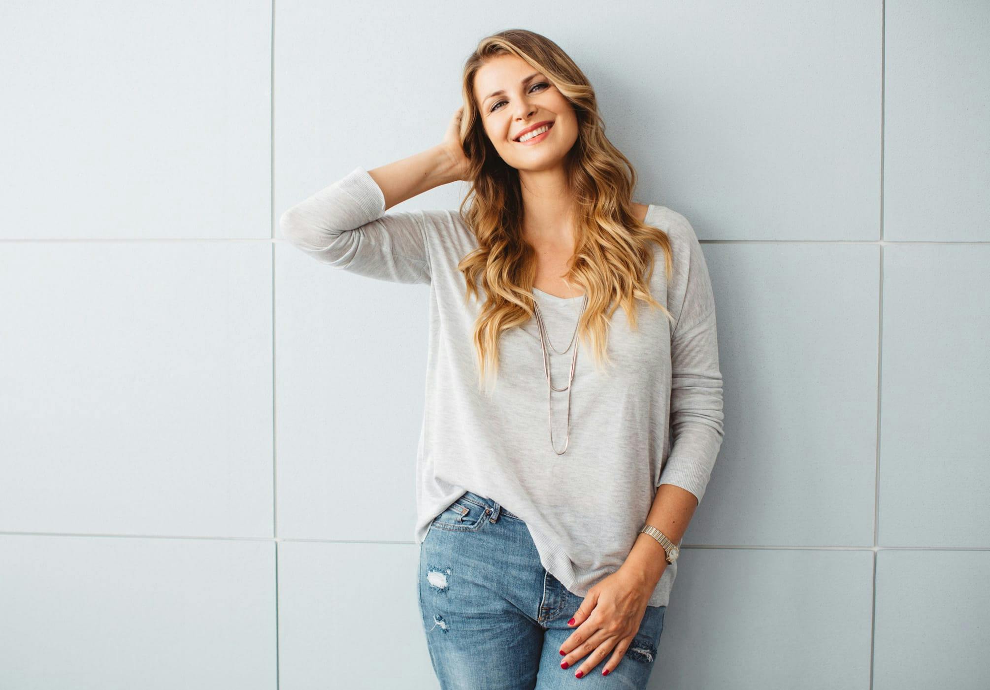 Woman wearing a grey top