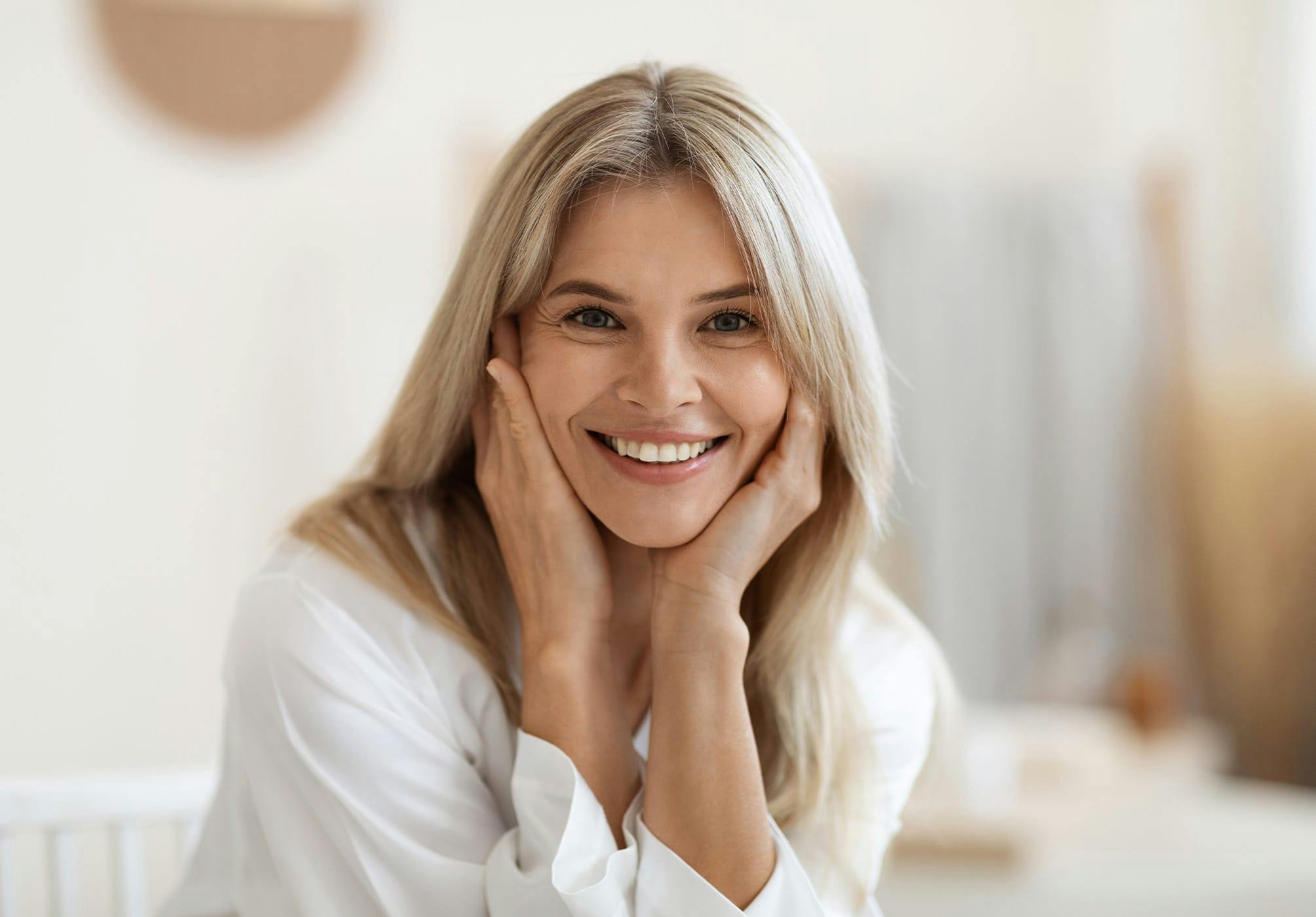 Woman touching her face